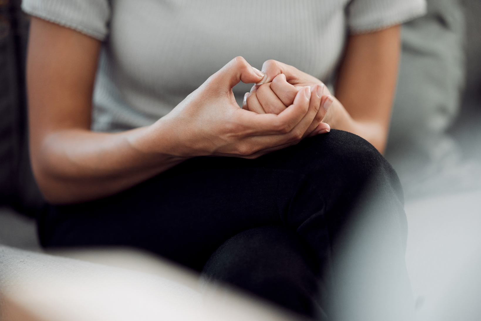 an anxious person picking at their nails
